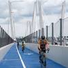 Cuomo said the path will help the local economies on either side of the bridge, which he said has been a draw for tourists. 3