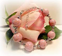 Jewelry made from dried funeral flowers. A Bracelet Made From The Flowers Of A Bridal Bouquet Dried Flower Jewelry Funeral Flowers Dried Flower Beads