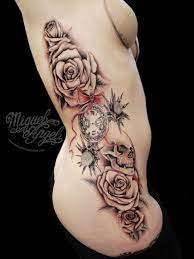 Browse this board for some suggestions, or. Pocket Clock Skull Roses And Thistle Custom Tattoo Rose Tattoo Design Rose Tattoos Best Tattoos For Women