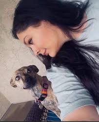 Woman adopts shy Plott Hound named Boo from humane society