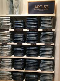 Spring 2014 Merchandising Inspiration Strong Signage Calling Out The Style Name This Was Continues Thro Clothing Store Displays Store Design Store Interiors