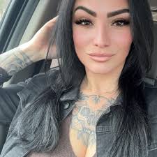 Who are recommended tattoo artists in Somerset KY for a full arm sleeve?