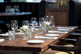 Functional and fashionable, a table runner may be placed directly on the surface of the table, or used atop a tablecloth for a layered look; Table Runner Vs Tablecloth Vs Bare Table Which Is Best Home Stratosphere