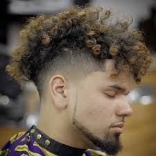 It's a superb combination between faded sides and a mess of curls on top that keeps all eyes on you. 70 Stunning Curly Mohawk Designs 2021 Bad Boy Style