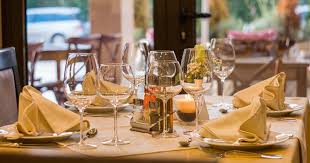This seaside wedding featured gorgeous watercolor table number cards fastened to seashell stands. Best Dining Etiquette Books On Table Manners Full Home Living