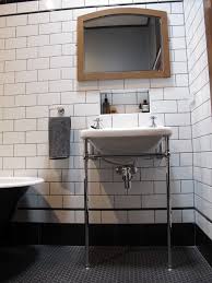 Combine accent tiles with simple border tile to create fascinating design ribbons that can act as backsplashes around a countertop. Our Latest Bathroom Renovation Subway Tiles Black Border And Pencil Tiles Grey Grout Cha Grey Bathroom Tiles Patterned Bathroom Tiles Luxury Bathroom Tiles
