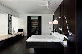 Striking dark oak hardwood boards run all along the floor surface of this luxury master bedroom with dark oak flooring and ocean views. Home Decor Dark Wood Floors Home Decor Interior Design Ideas