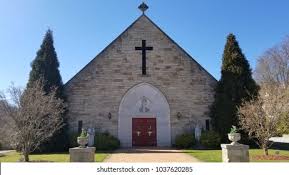 Cast iron bridge in the foreground. Catholic Church Front View Stock Photo Edit Now 1037620285