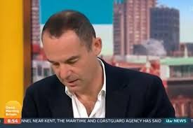 Kate Garraway grabs Martin Lewis' hand as he announces long break from GMB 