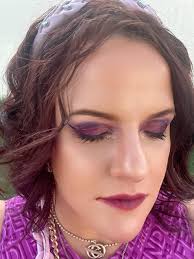 Lipstick-stained photo of a purple look