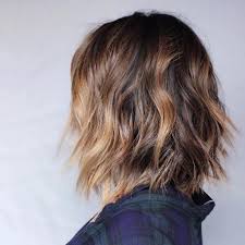 Sexy tousled wavy bob for brunettes. Most Attractive Medium Wavy Hairstyles In 2019