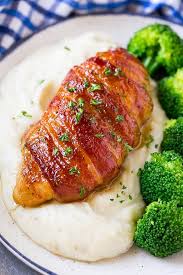 Bacon Wrapped Chicken Served Over Mashed Potatoes With Broccoli On The Side Bacon Wrapped Chicken Recipes Bacon Wrapped Chicken Chicken Dinner