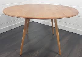 Ercol round drop leaf dining table, 1960s. Ercol Round Drop Leaf Dining Table 1960s 161177