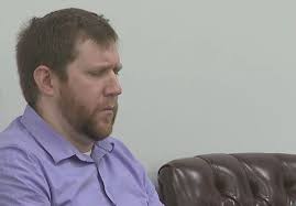 Tennessee teacher who admitted to filming students in locker room cries in  court