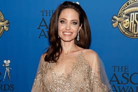 Angelina jolie dcmg is an american actress, filmmaker, and humanitarian. Angelina Jolie Opens Up About Family Adoption And Refugees People Com