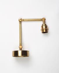 These lights look great both indoors and out and add to any coastal decor. Brass Wall Lights Fender In Polished Brass Or Antique Black