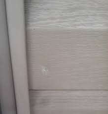 After We Removed The Shutters From Our Front Porch There Were Several Screw Holes To Patch In The Vinyl Siding Vinyl Siding Repair Vinyl Siding Siding Repair