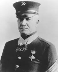 Daniel Daly was a Marine of unbreakable grit, small in size but legendary  in battle. Born in 1873 in Glen Cove, New York, he stood just 5 feet 6  inches tall and