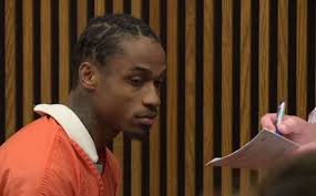 Man accused of killing couple at car dealership issued $5 million bond