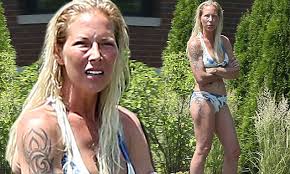 Throughout the years, eminem has mentioned kim frequently in his lyrics. Eminem S Ex Wife Kim Mathers Looks Healthy In White And Blue Bikini Daily Mail Online