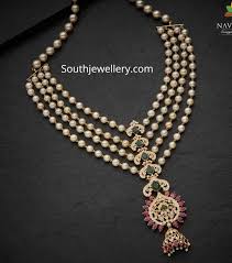 See more ideas about jewelry design, indian jewelry, traditional jewelry. 22 Carat Gold Layered South Sea Pearl Necklace With Central Pendant Studded With Cz Stones Rubi Gold Pearl Jewelry Pearl Jewelry Design Pearl Necklace Designs