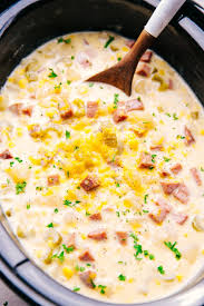 Crock Pot Cheesy Ham And Potato Soup Thick Chunks Of Ham And Potatoes Nestled In A Creamy Broth With C Cheesy Ham Ham And Potato Soup Soup Recipes Slow Cooker