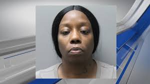 Troy woman charged with husband's homicide