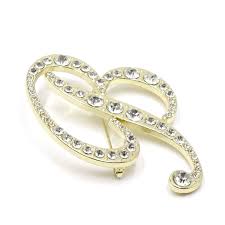 letter brooch