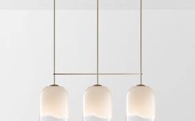 Crafted of formed steel, this indoor fixture features a cylinder shade with frosted inner glass and clear outer glass for a unique look. Moni Extra Large Triple Pendant By Articolo Lighting Archello
