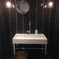 Looking for tiling ideas for your bathroom? Black Chevron Tiles With White Grout In The Bathroom Chevron Tile Black Chevron Tile White Grout