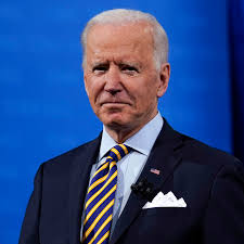 Biden defends progress