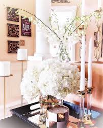 White House Decor Ideas White Candles White And Gold Home Decor White Flower Centerpiece Gold Glass Coffee Table Decor Home Decor Coffee Table Centerpieces
