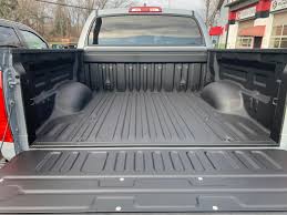 8 to 13 chevy silverado short 5'9 see damage on one corner. Schmidtsrustproofing