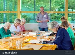 Group Of Six Female Senior Citizens At Long Table In Art Class With Male Teacher In Gl In 2020 Healthy Meal Delivery Service Activities For Teens Healthy Food Delivery