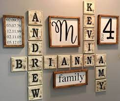 The rule of thumb for hanging wall decor over a mantel is that the art piece is roughly the same size as the firebox. Farmhouse Scrabble Wall Decor Scrabble Wall Art Scrabble Wall Decor Family Wall Art