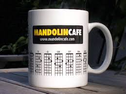 The outside of each mug is a dark and elegant color while the inside varies with beautiful jewel tones. Mandolin Cafe 21 Chord Coffee Cups Mandolin Cafe