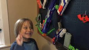 Attach 2 hooks spaced about the same length as your nerf gun for each gun you want to store and hang them over the hooks for quick, efficient storage. Diy Nerf Gun Peg Board Organizer Gathered In The Kitchen