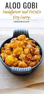 Earthy And Flavorful Aloo Gobi Dry Potato And Cauliflower Sabzi Recipe Indian Food Recipes Vegetarian Indian Cooking Indian Food Recipes