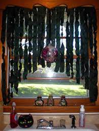15 Cool Ideas To Decorate A Spooky Halloween Kitchen Proud Home Decor Halloween Curtains Diy Halloween Decorations Halloween Kitchen