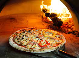 A chiminea is a free standing front loading fireplace or oven with a bulbous body and usually a vertical smoke vent or. Baking In A Chiminea