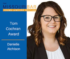 Danielle Atchison receives the YLS Tom Cochran Award for community service