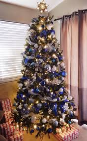 Christmas Tree Blue Silver White And Gold With Mesh Ribbon Blue Christmas Tree Decorations Elegant Christmas Trees Christmas Tree Themes