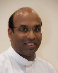 Priest dies as car collides with transport bus