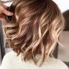 The delicate caramel highlights would be easy to recreate at home with a box dye in the same color. 3