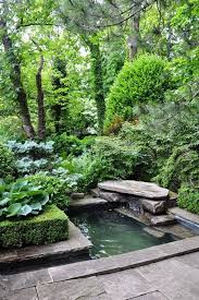 Pond Is Focal Point Of A Lush Garden Gardens Click Water Features In The Garden Small Water Features Pond Water Features