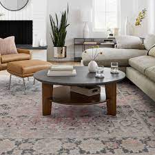 This coffee table with lift top also features open shelves for additional storage and display. Dakota Coffee Table