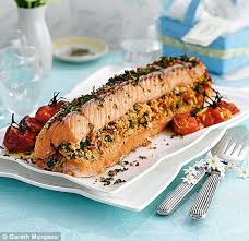 Learn the rich history behind the religious activities you do with your loved ones to celebrate the holiday. A Feast For Easter Roast Salmon With Salsa Verde Stuffing Daily Mail Online