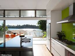 A dark grey shaker style door with a wood grained detail. Sydney Home Rented By Angelina Jolie To Film 2014 S Unbroken Hits The Market For 11million Daily Mail Online