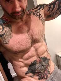 Side and lower stomach tattoos can vary from small to large but most people choose large designs because the area itself allows it. Untold Stories And Meanings Behind Dave Bautista S Tattoos Tattoo Me Now