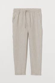 Poches côtés et arrière à passepoils en daim marron. Linen Joggers Light Beige White Striped Ladies H M Us Pantalon Jogger Pantalon Lin Beige Clair